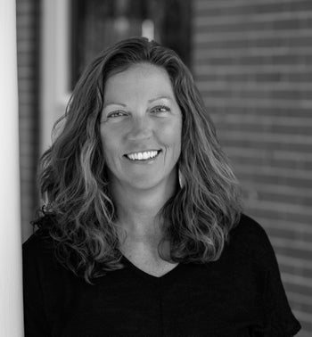 Portrait of Laurie Huggins, Broker / Partner / COO